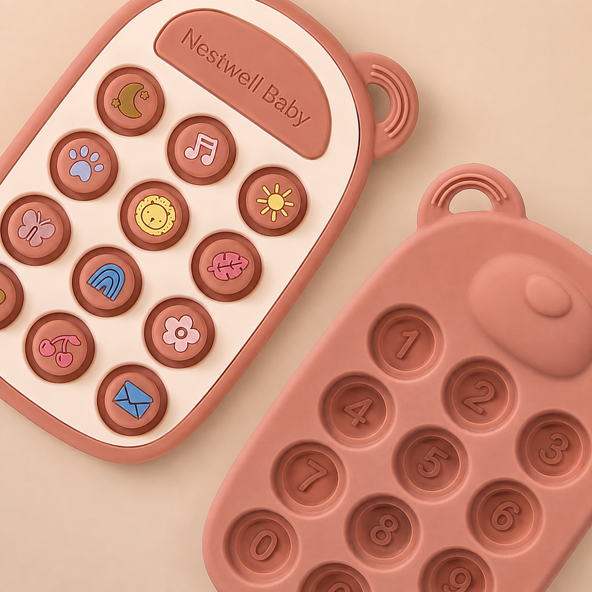 Nestwell Baby silicone phone press toy with pacifier clip, teething toy