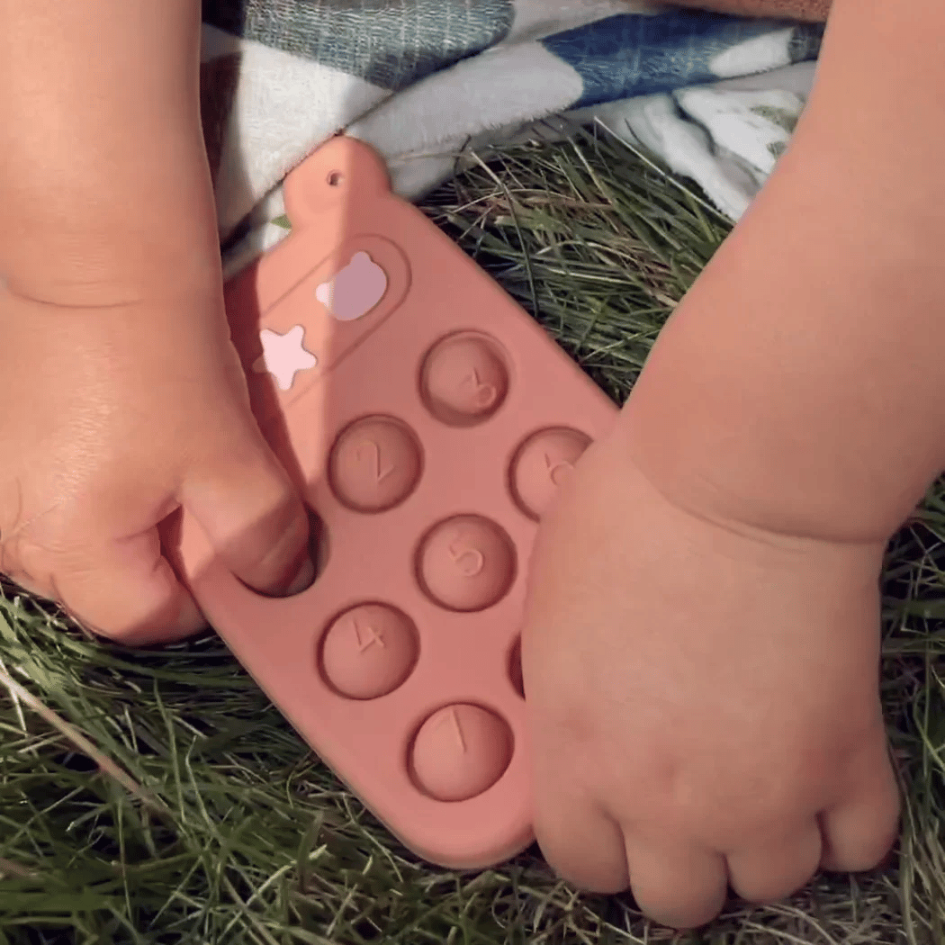 Nestwell Baby silicone phone press toy - pacifier clip detail
