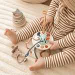 Nestwell Baby UFO silicone pulling toy - in use